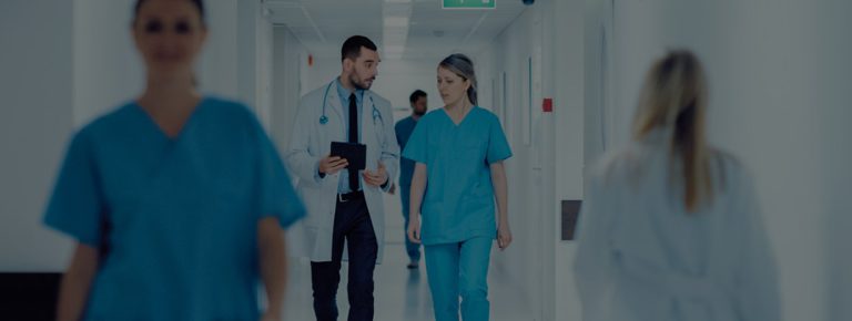 doctor and nurse conversing during hospital walkthrough