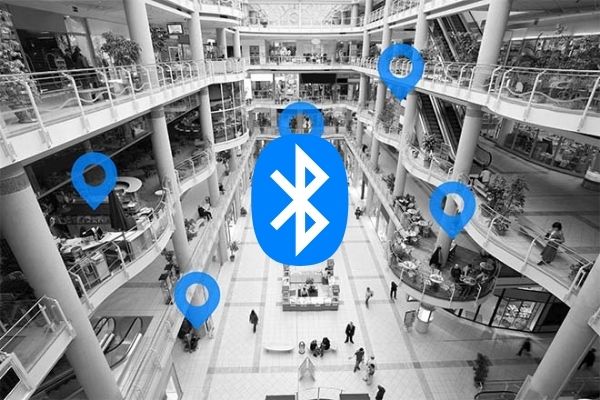 Bluetooth logo overlayed on birds view image of a mall