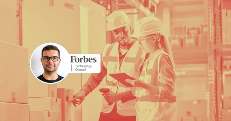 two warehouse workers looking at handheld screen, Fabio Belloni Forbes tech council logo