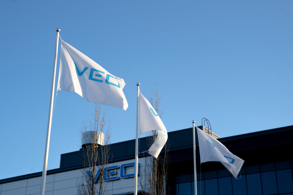 VEO headquarters with flags waving 